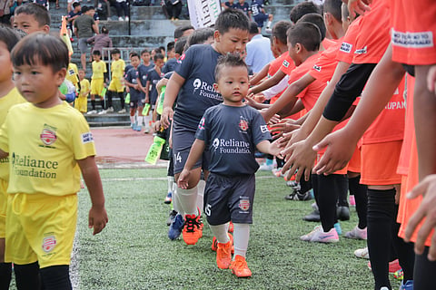 Young footballers competing in the RFYC Naupang League.