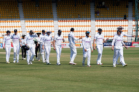 Pakistan vs England 1st Test: England's Ollie Pope, right, and teammates after winning the first test