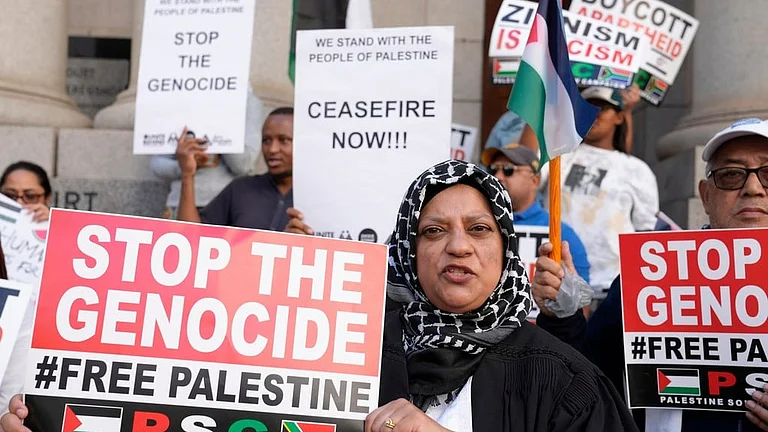 Demonstrators hold placards in support of South Africa’s case against Israel at the International Court of Justice (ICJ) of committing genocide against Palestinians in the Gaza Strip. - AP Photo/Nardus Engelbrecht, File