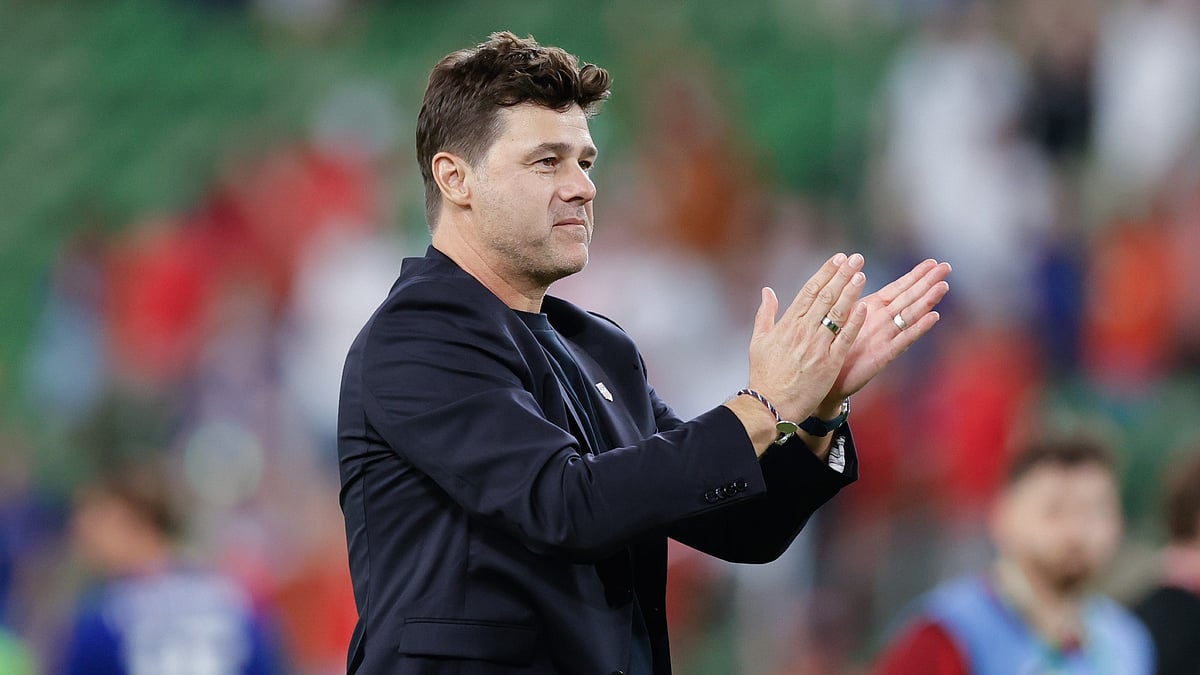 Mauricio Pochettino celebrates USA's victory.