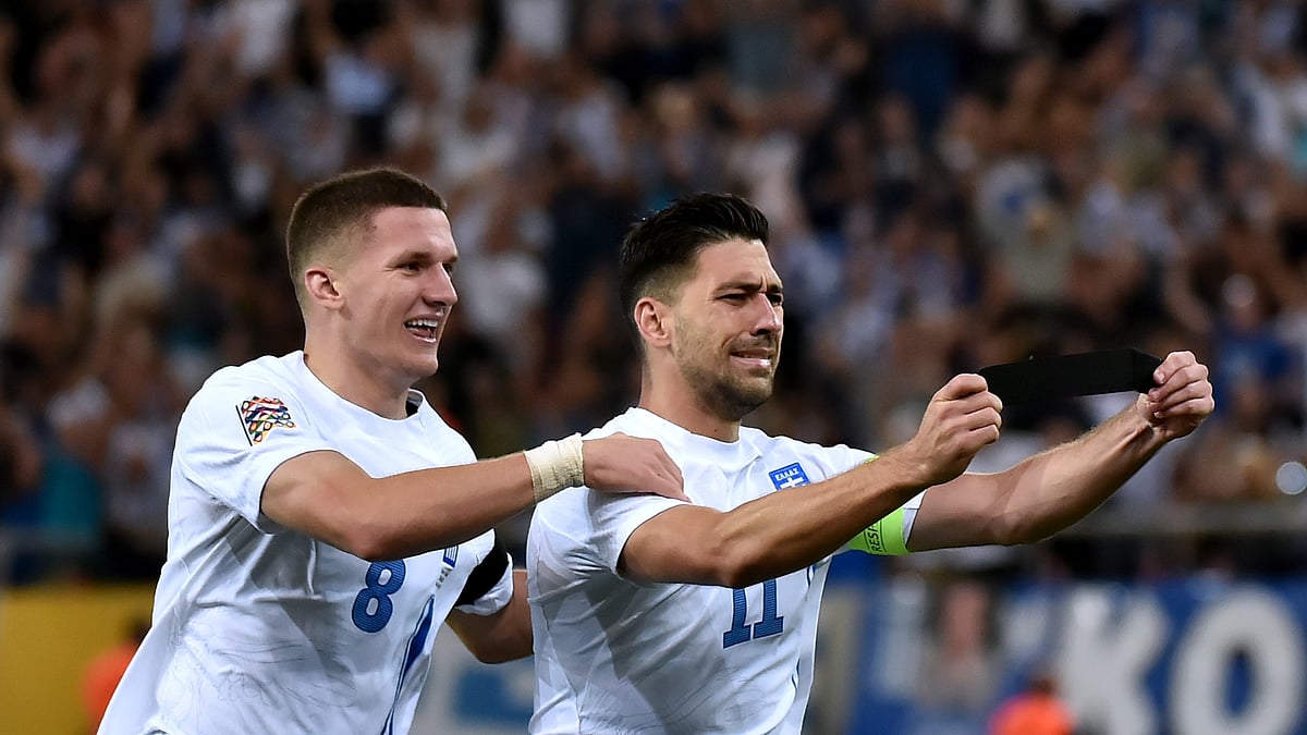 Anastasios Bakasetas pays tribute to George Baldock after his goal on Sunday.
