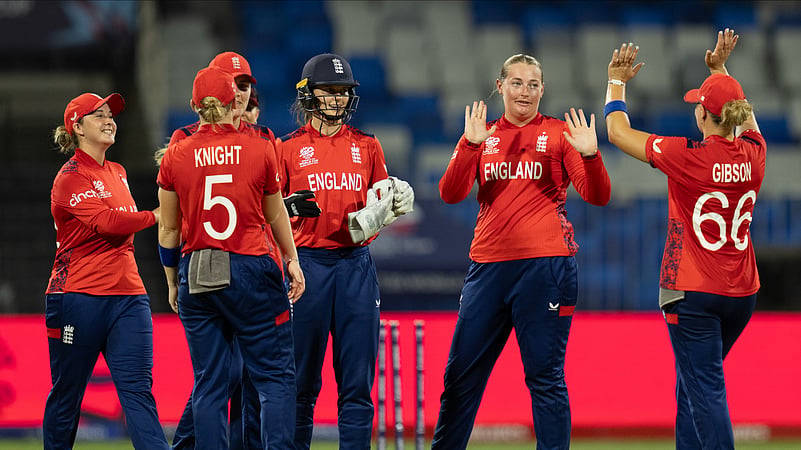 Englands Sophie Ecclestone, second right, celebrates the wicket. AP Photo