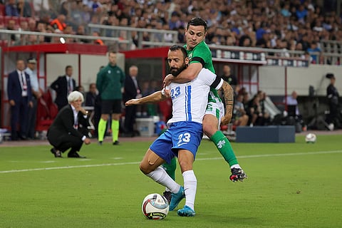 Nations League Soccer: Ireland's Josh Cullen fights for the ball with Greece's Manolis Siopis