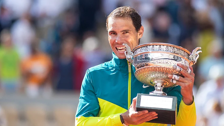 Rafael Nadal celebrates his French Open win in 2022 - null