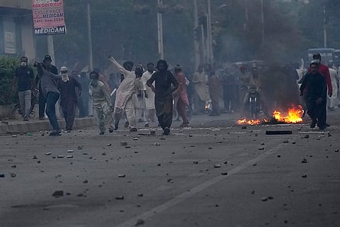 Supporters of the TLP clash with Police