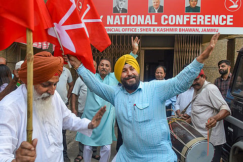 National Conference workers celebrate