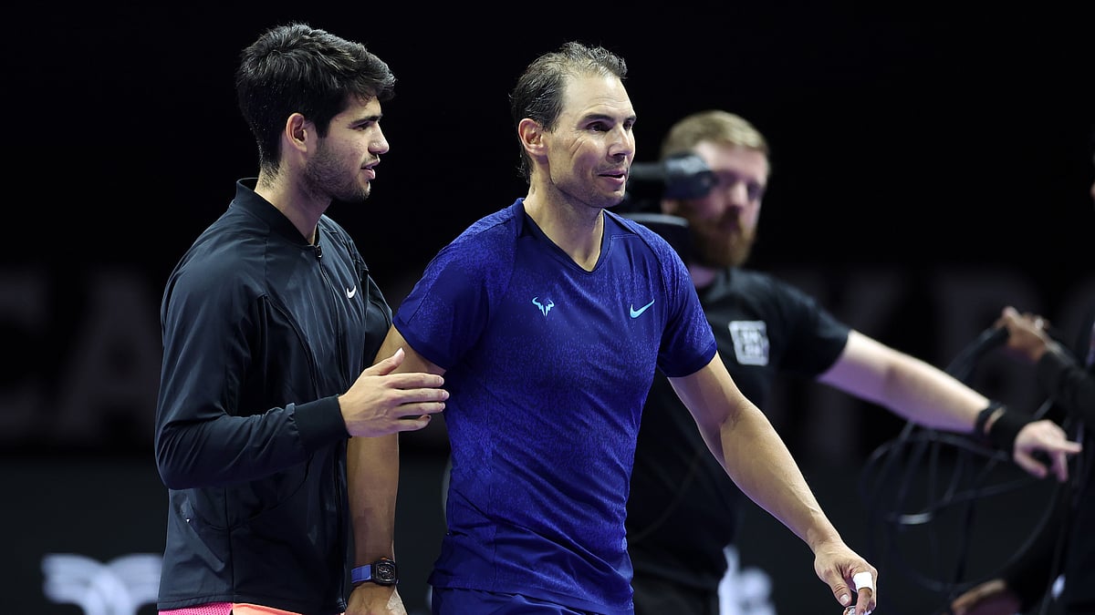 Carlos Alcaraz greets Rafael Nadal after their semi-final match.