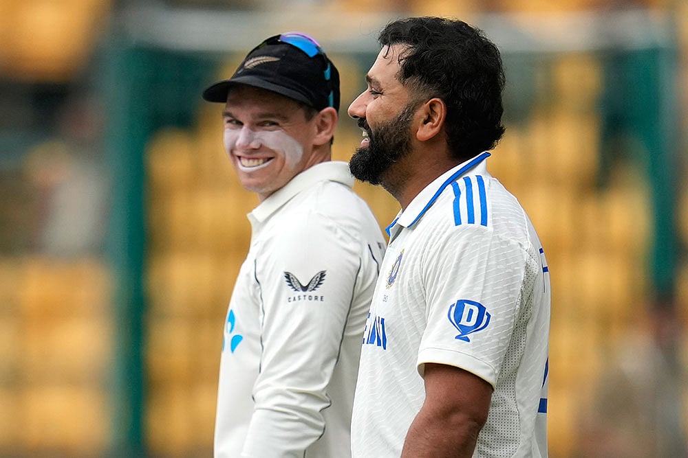 India vs New Zealand 1st Test Cricket Day 2 Photo gallery_Rohit Sharma and Tom Latham
