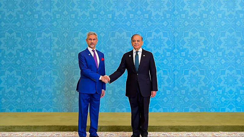 External Affairs Minister S Jaishankar shakes hands. PTI Photo