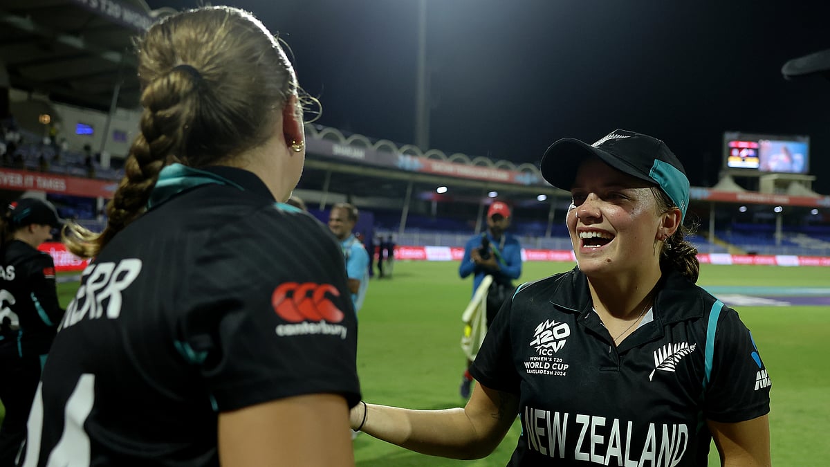 Eden Carson celebrates with Melie Kerr after New Zealand's win over West Indies