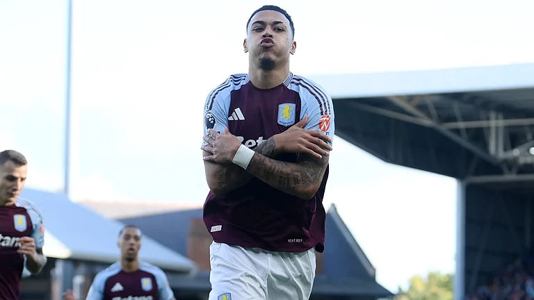 Morgan Rogers celebrates scoring the equaliser against Fulham - null