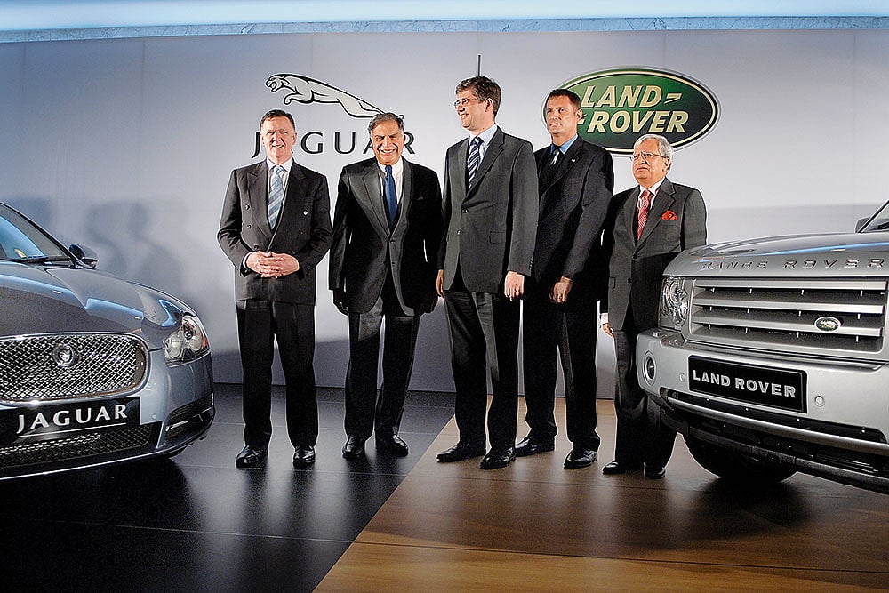 Foreign Investment: Ratan Tata (second from left) and Ravi Kant, vice-chairman of Tata Motors (right) with the top brass of JLR - Photo: Getty Images