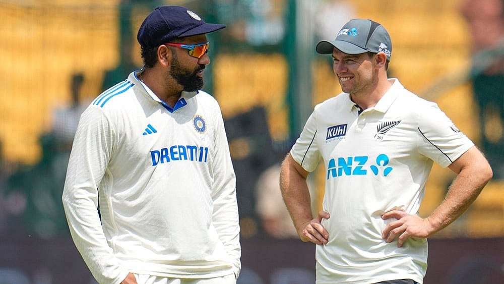 IND Vs NZ 1st Test: New Zealand's captain Tom Latham, right, speaks to India's captain Rohit Sharma  - | Photo: AP/Aijaz Rahi