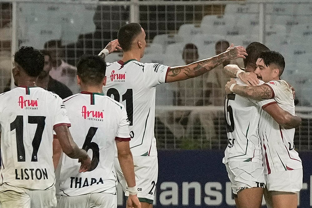 | Photo: PTI/Swapan Mahapatra : ISL 2024: Dimitrios Petratos (9) of Mohun Bagan Super Giant celebrates with teammates after scoring a goal