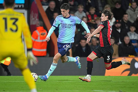 EPL 2024-25: Arsenal's Kai Havertz, centre, challenges for the ball with Bournemouth's Milos Kerkez