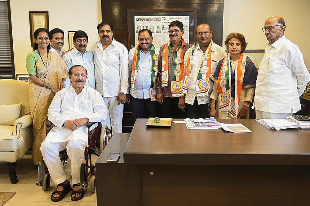 NCP (SP) chief Sharad Pawar, party leaders Supriya Sule and Jayant Patil 