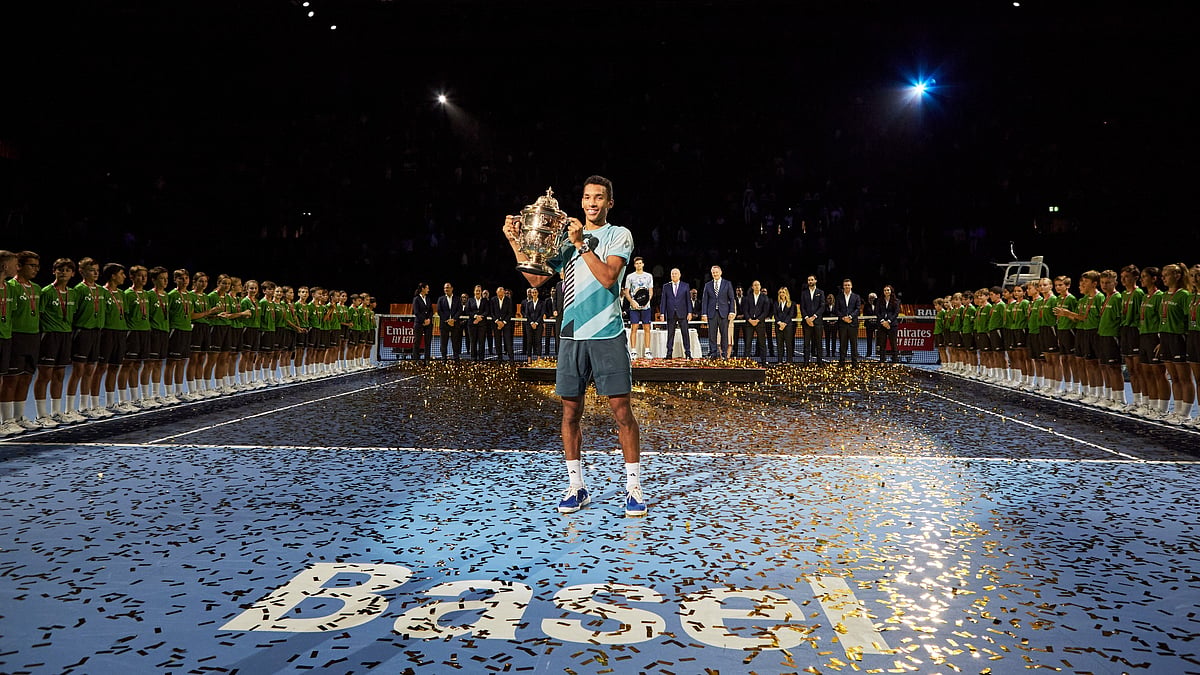 X : Felix Auger-Aliassime with the 2023 trophy.