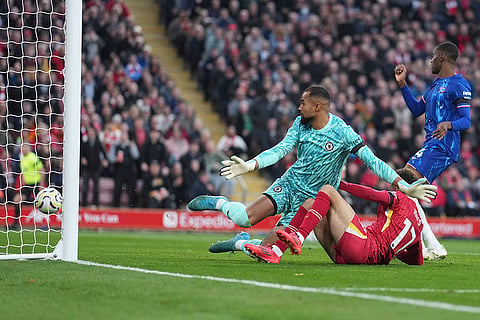 EPL 2024-25: Liverpool's Curtis Jones, right, scores his side's second goal