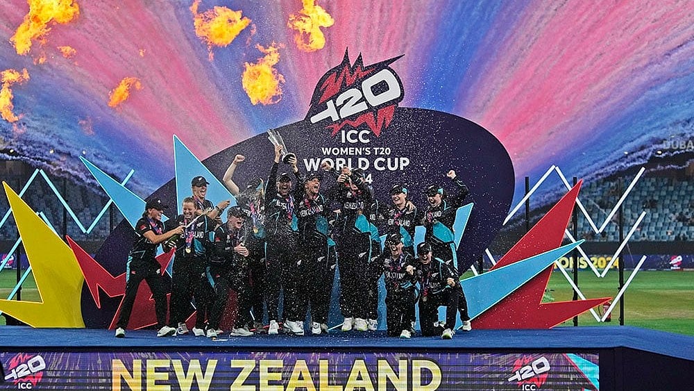Women's T20 WC 2024 Final: New Zealand's players pose with the trophy - | Photo: AP/Altaf Qadri