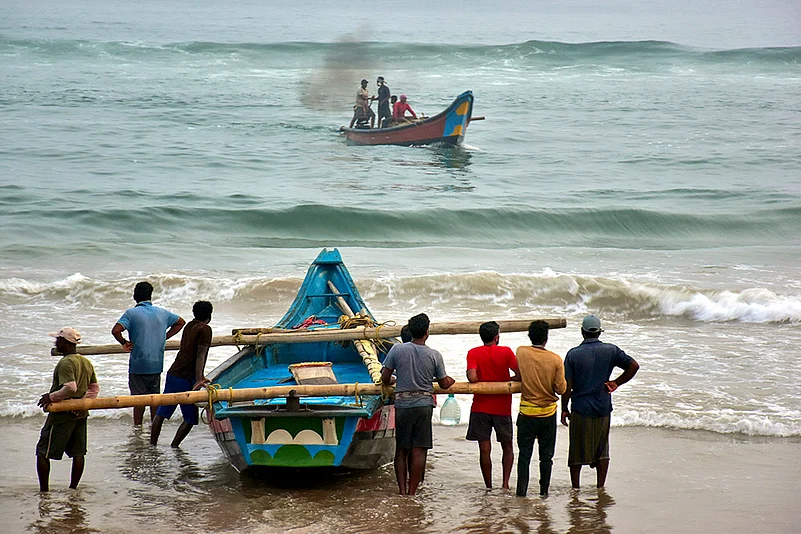 India weather: Preparations for Cyclone Dana Fishermen shift their boats in Puri