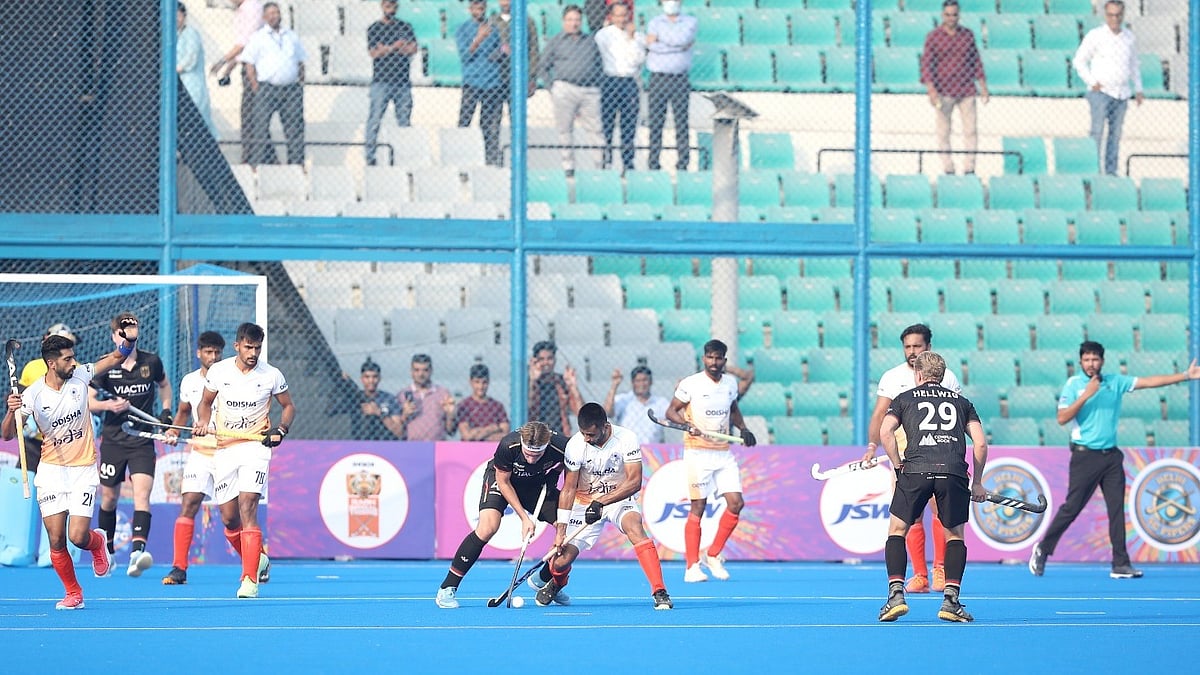 Special Arrangement : Action from the first hockey Test between India and Germany in New Delhi.
