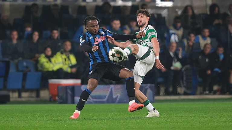 Lookman (left) in action against Celtic - null