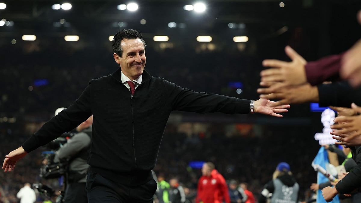 Unai Emery interacts with Aston Villa's supporters after the win over Bologna.