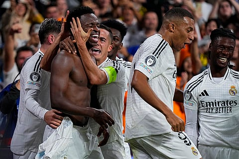Champions League 2024-25: Real Madrid's Vinicius Junior, left, celebrates with teammates after scoring his side's fourth goal 
