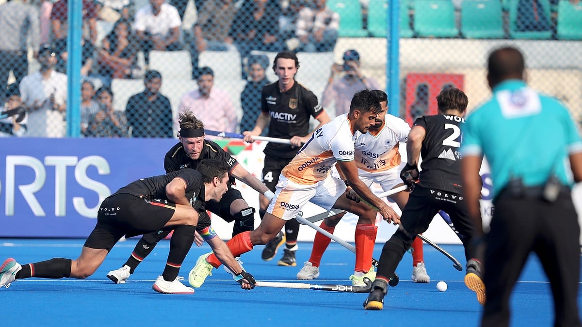 Special Arrangement : Action from the first hockey Test between India and Germany in New Delhi.