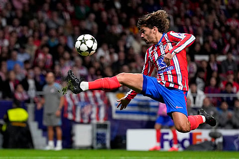 Champions League 2024-25: Atletico Madrid's Antoine Griezmann tries to control the ball