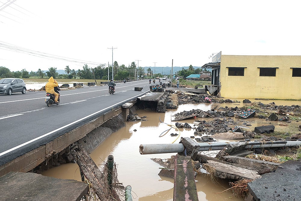 Philippines Albay province Tropical Storm Kristine (Trami)_Debris from a damaged road in Polangui