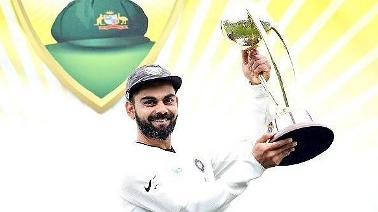 Former India captain Virat Kohli with Border-Gavaskar Trophy in 2018. - Photo: X | Tanuj Singh