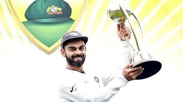 virat kohli with bgt trophy in 2018 X tanuj singh