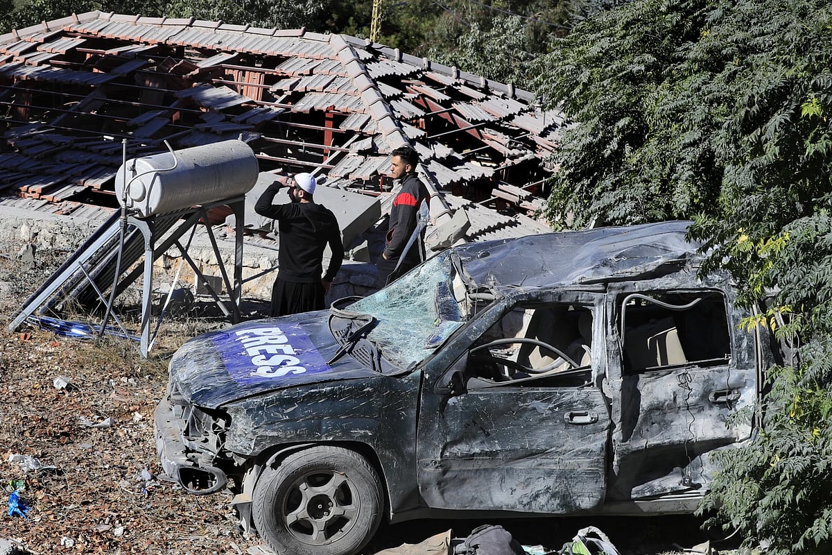 AP : Site where Israeli airstrike hit the media compound |