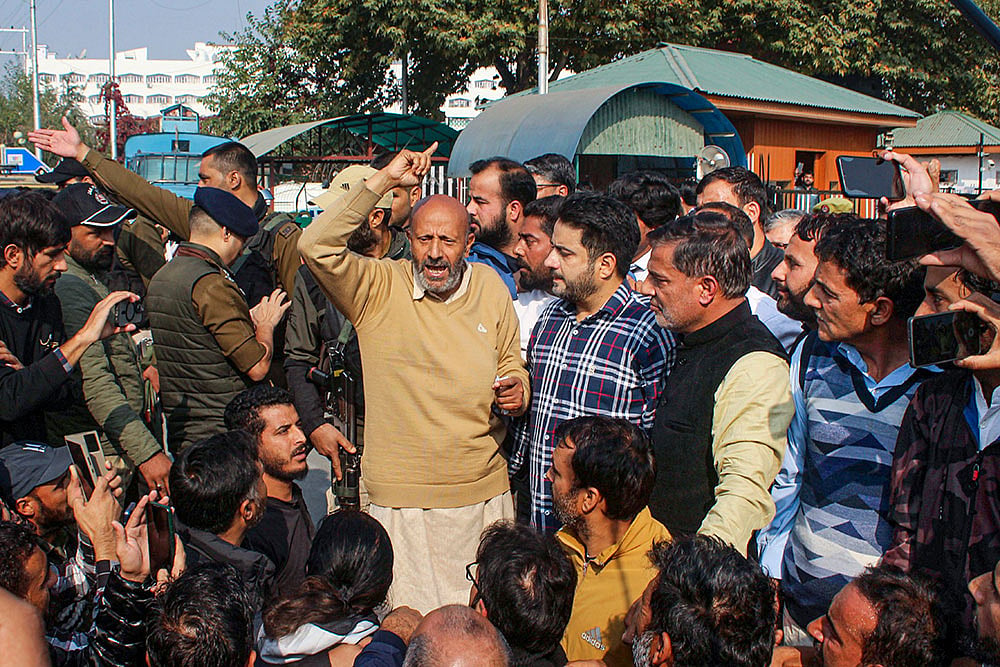 Photo: PTI : Engineer Rashid protesting in Srinagar |