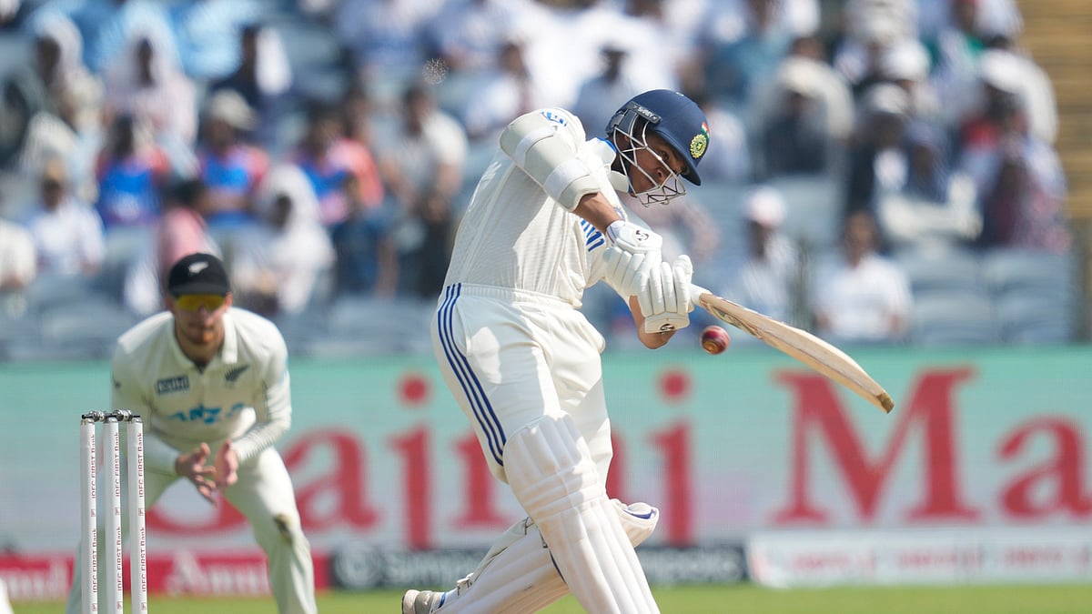 AP Photo/Rafiq Maqbool : India's Yashasvi Jaiswal plays a shot during day three of the second cricket test match between India and New Zealand at the Maharashtra Cricket Association Stadium, in Pune.