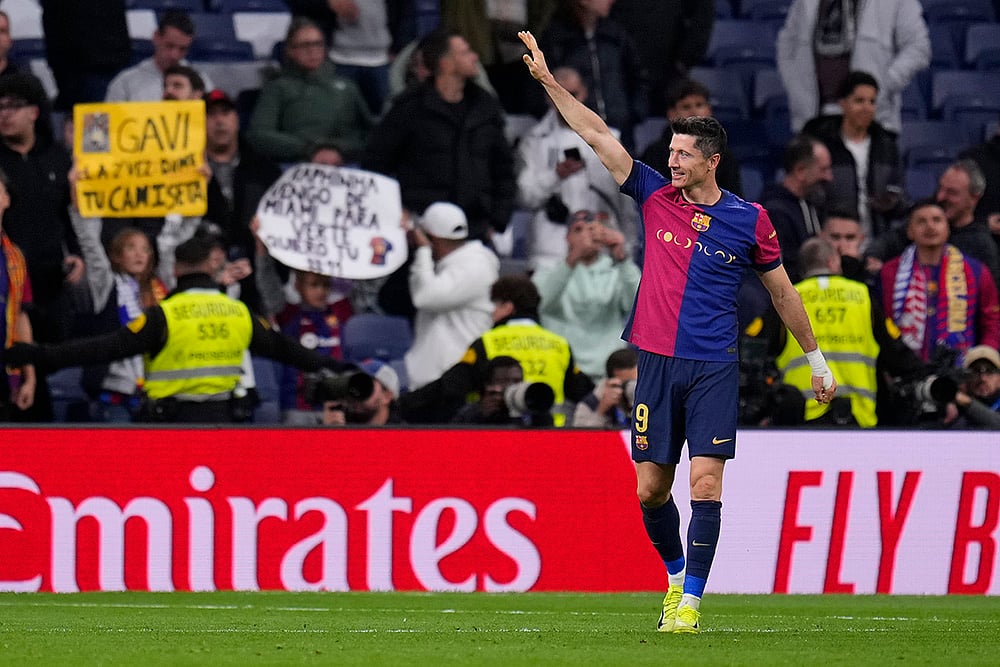 | Photo: AP/Manu Fernandez : La Liga 2024-25: Barcelona's Robert Lewandowski celebrates after the match against Madrid
