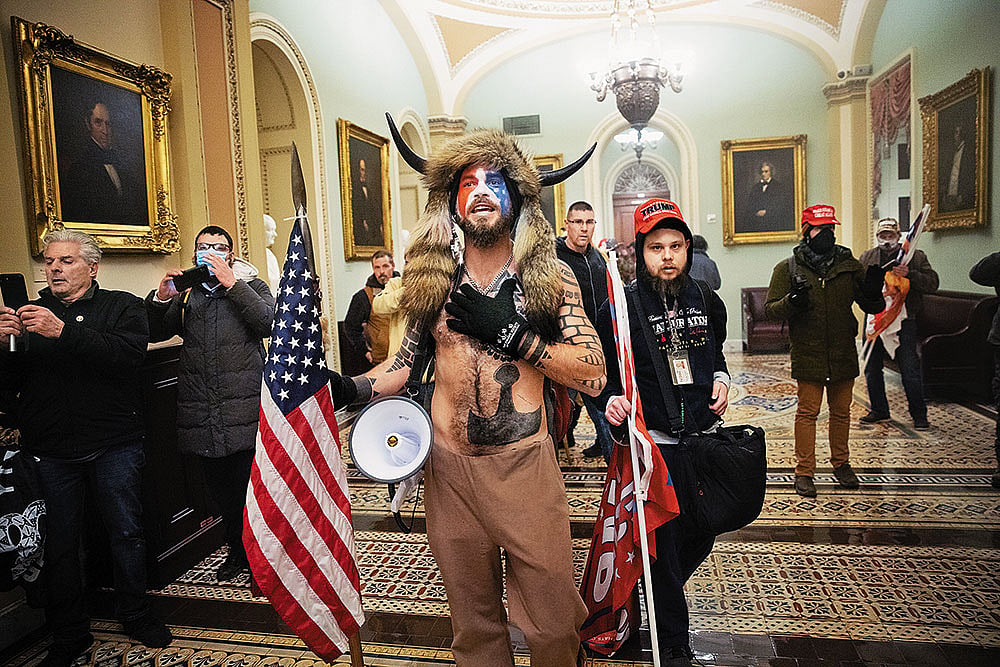 The Big Clash: A pro-Trump mob confronts US Capitol police outside the Senate chamber in 2021