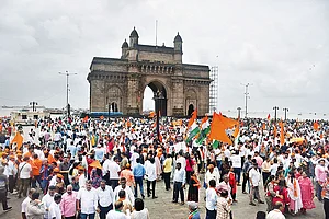 Photo: Getty Images : Joining for a Gateway: Maha Vikas Aghadi alliance supporters at a protest march against the
Mahayuti coalition government in Mumbai on September 1, 2024