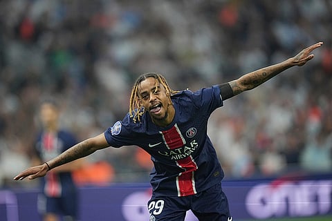 Ligue 1 Soccer 2024-25: PSG's Bradley Barcola celebrates after scoring his side third goal