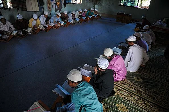 Children reading Quran at a madrasa (representative image)