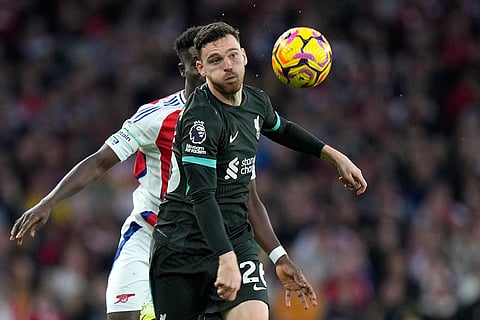 Premier League 2024-25: Liverpool's Andrew Robertson controls the ball 