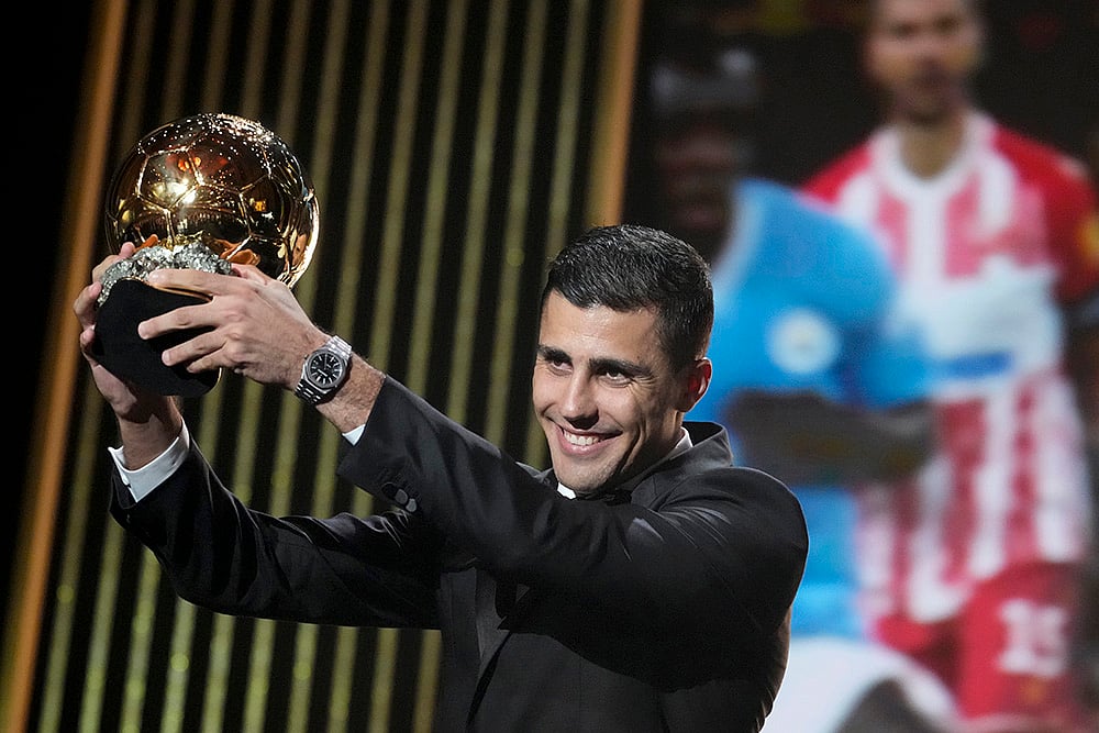 | Photo: AP/Michel Euler : Ballon d' Or Awards: Rodri receives the 2024 Men's Ballon d'Or award