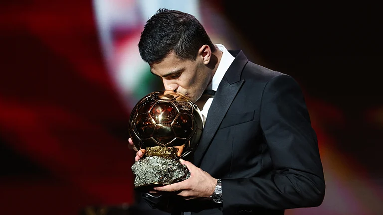 Manchester City's Rodri won the Ballon d'Or on Monday. - null
