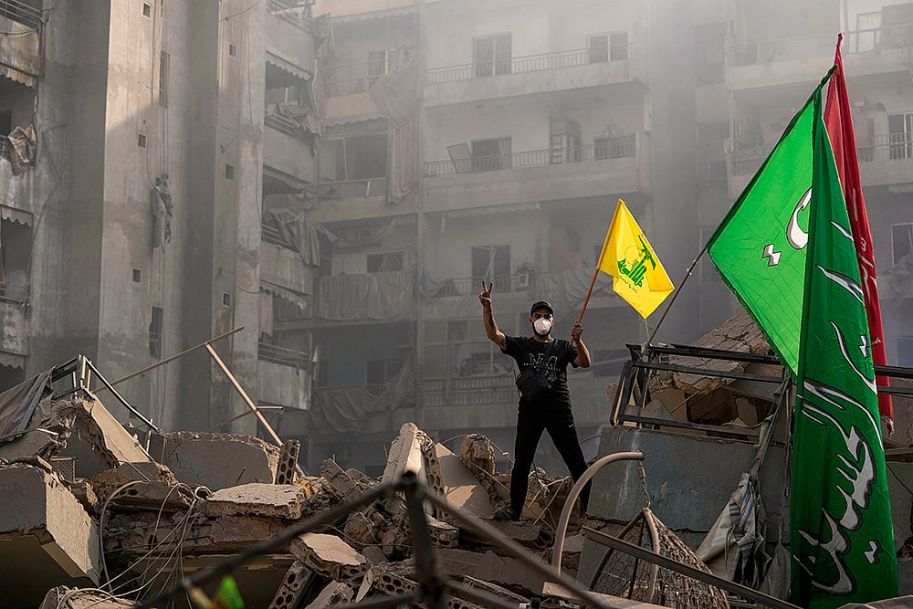| Photo: AP/Hassan Ammar : Israeli airstrike in Dahiyeh