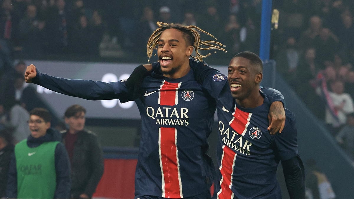 Ousmane Dembele celebrates with Bradley Barcola