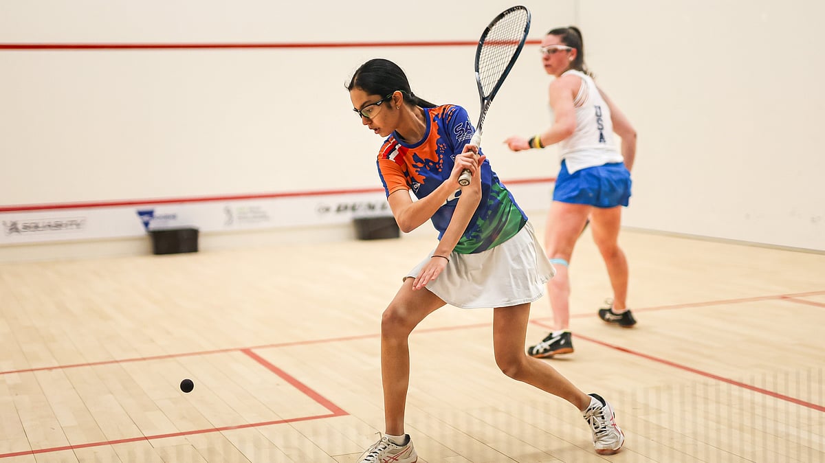 Special Arrangement : File photo of Indian squash player Anahat Singh (left) in action. 