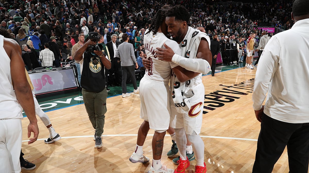 Darius Garland #10 and Donovan Mitchell #45 of the Cleveland Cavaliers after the game against the Milwaukee Bucks during a regular season game on November 2, 2024 at Fiserv Forum Center in Milwaukee, Wisconsin. - null