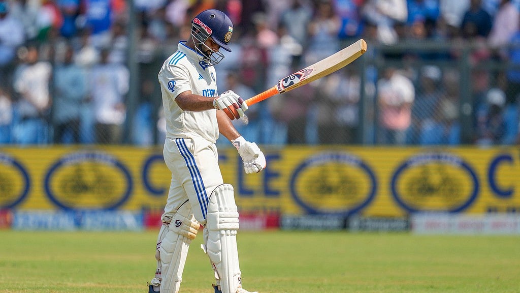 Rishabh Pant walks off the field after losing his wicket during the third day of the third Test between India and New Zealand at Wankhede Stadium. - AP