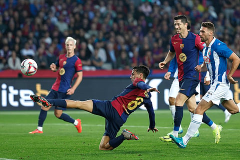 La Liga 2024-25: Barcelona's Pedri, centre, in action against Espanyol